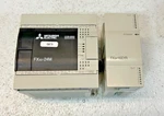 Mitsubishi FX3G-24MR/ES Controller W/ FX2N-16EYR-ES/UL Output Module Used. Price: $120.00.
