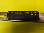Used Lion Precision LRD6110 High Speed Transparent Slot Fork Label Sensor. Price: $190.00.