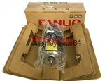 One New Fanuc Servo Motor A06B-2064-B303. Price: $2470.00.