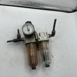 Smc AW20-02CG-A AW2002CGA Filter Reducing Valve With Pressure Gauge W/ AFM20-02C Used. Price: $60.00.