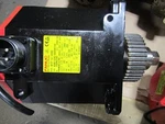 Fanuc A06B-0243-B000 Servo Motor Used. Price: $1750.00.